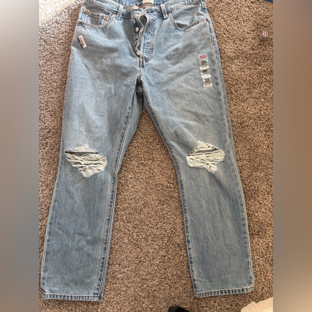 Levi's Light Blue Straight Jeans with Distressed Details